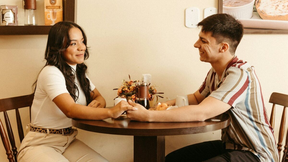 a man and a woman sitting at a table
