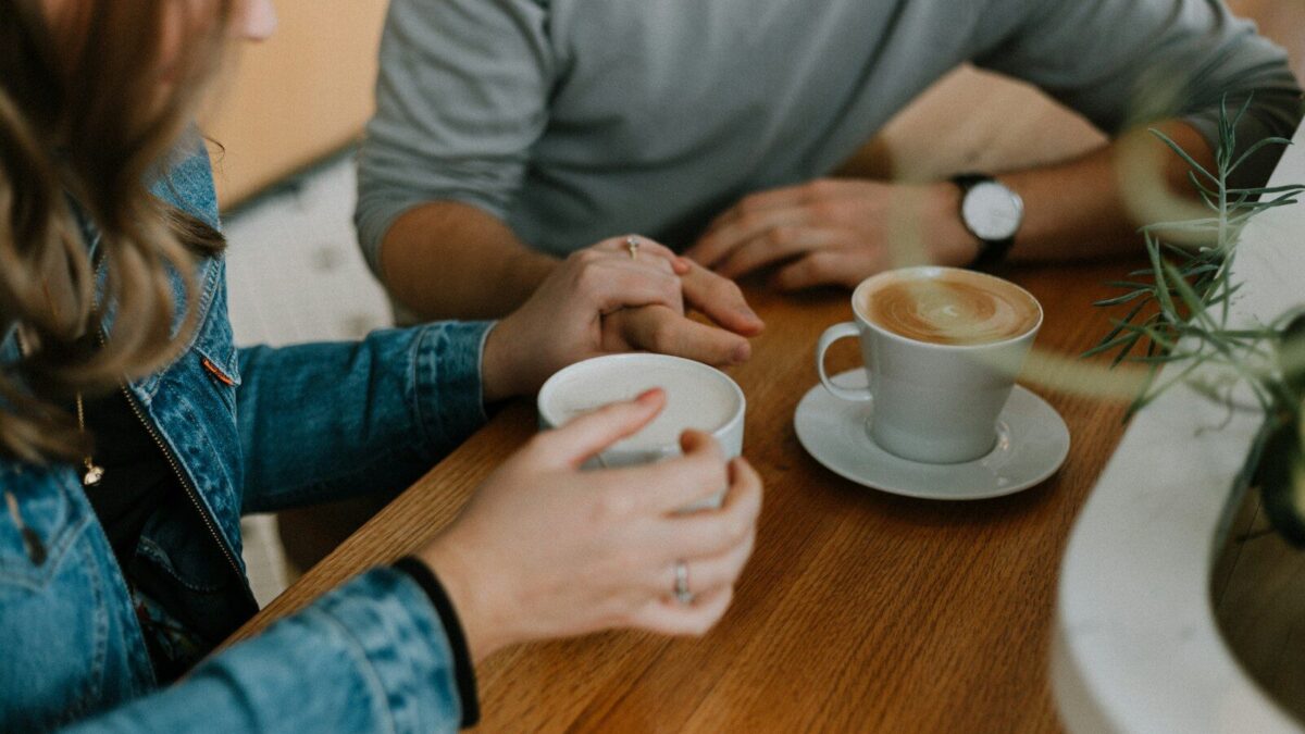 two mugs with coffee on table