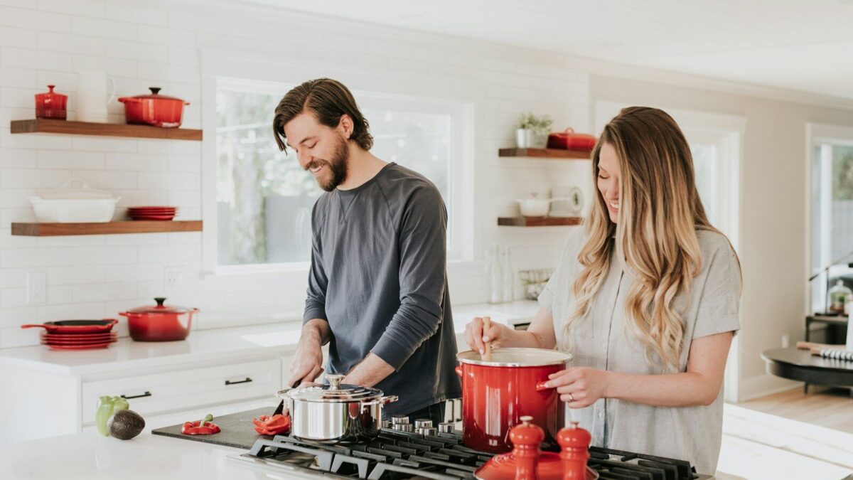 man and woman on kitchen