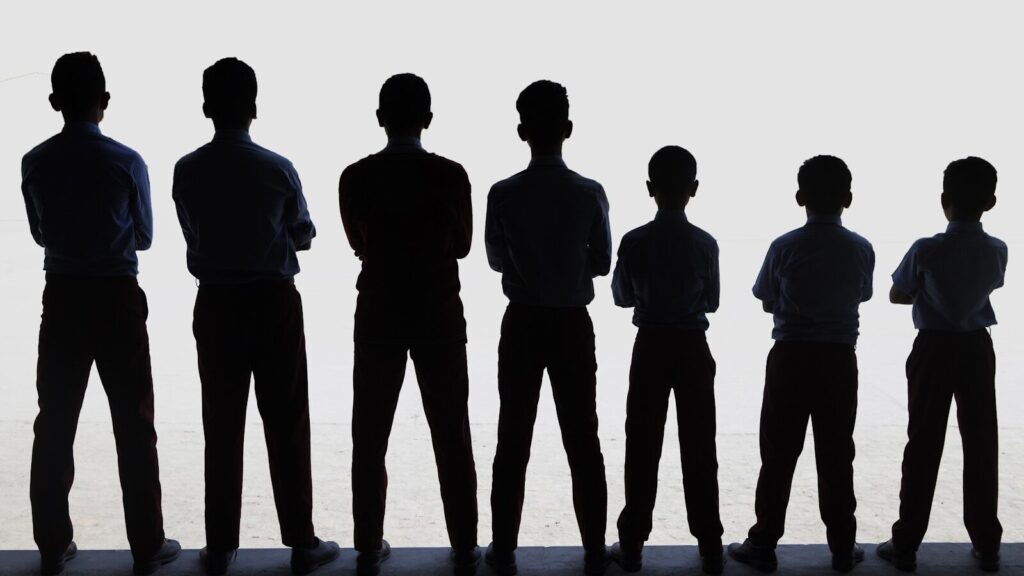 A group of people standing next to each other