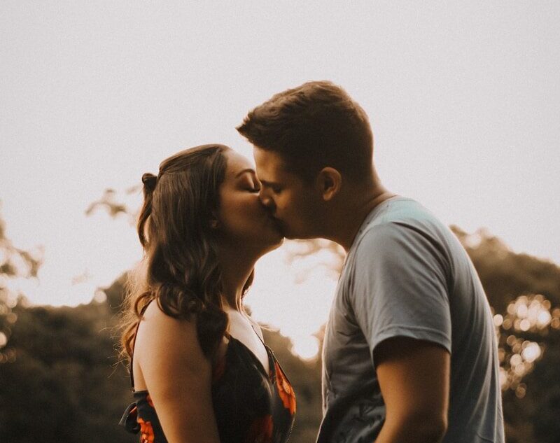 couple kissing during daytime